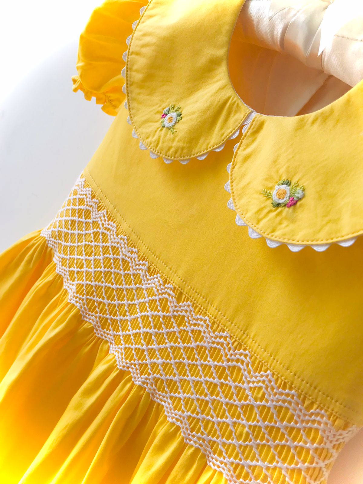 Yellow smocked dress with peterpan collar
