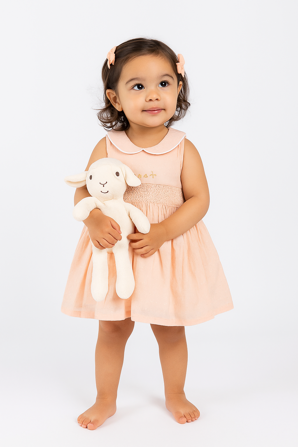 Light peach hand embroidered smocked dress